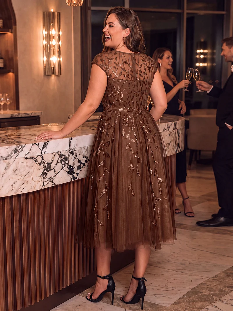 Robe invitée mariage grande taille à paillettes coupe trapèze