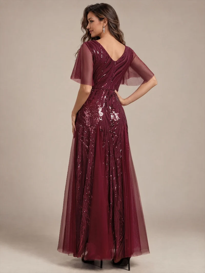Robe longue en tulle à paillettes avec manches volantées