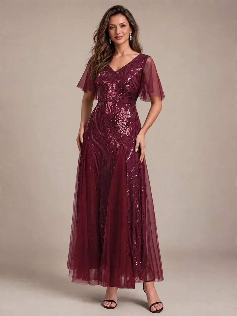 Robe longue en tulle à paillettes avec manches volantées