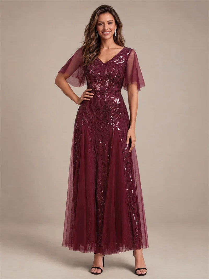 Robe longue en tulle à paillettes avec manches volantées