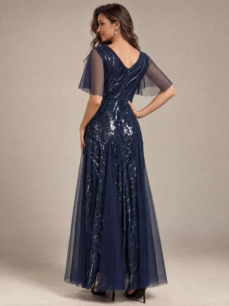 Robe longue en tulle à paillettes avec manches volantées