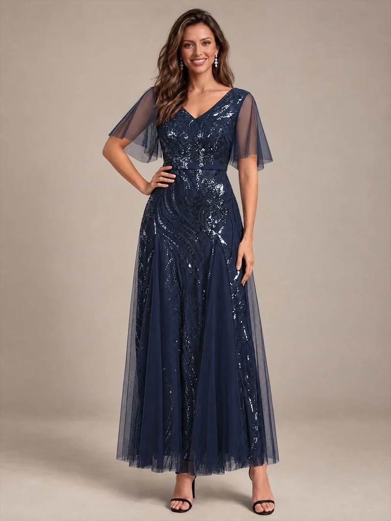 Robe longue en tulle à paillettes avec manches volantées