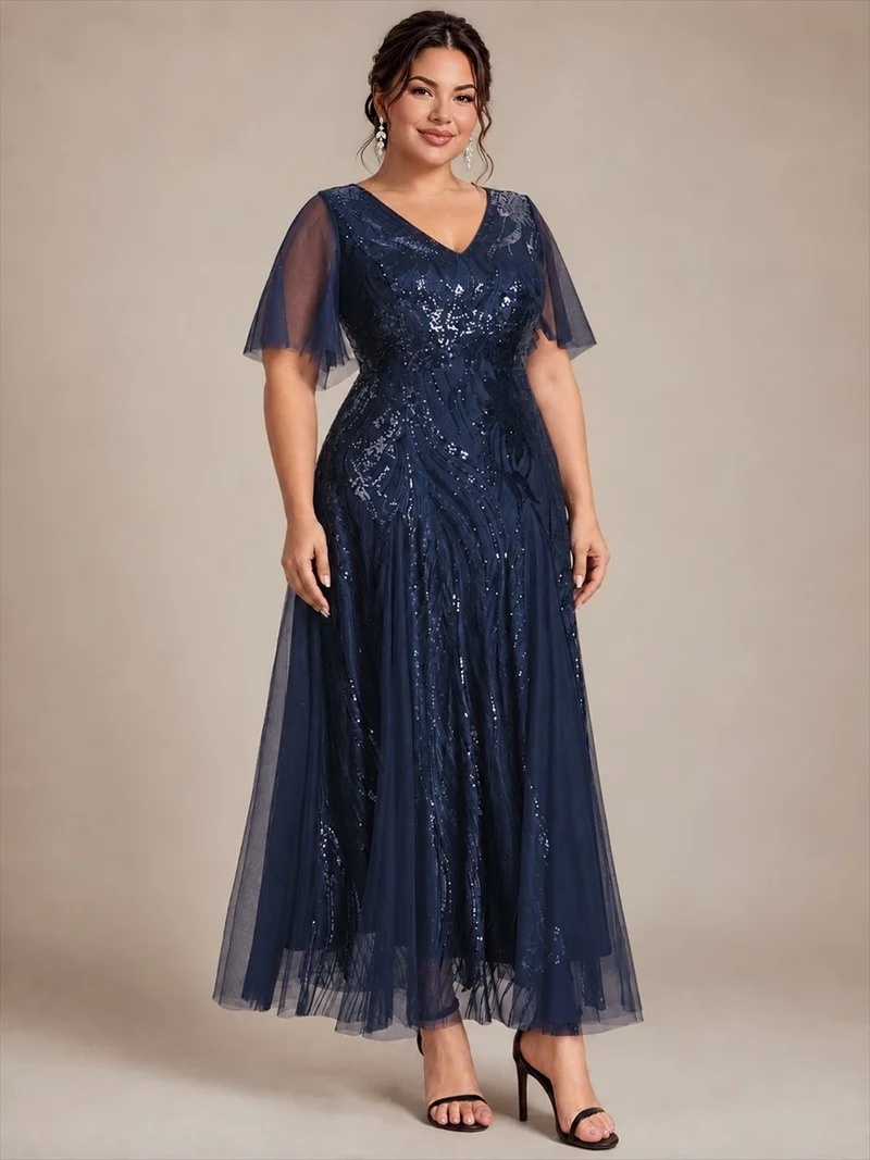 Robe longue en tulle à paillettes avec manches volantées