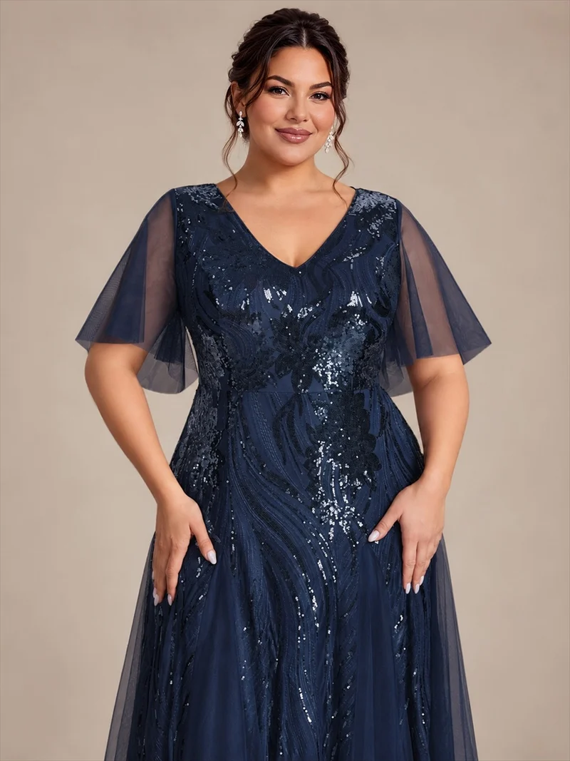 Robe longue en tulle à paillettes avec manches volantées