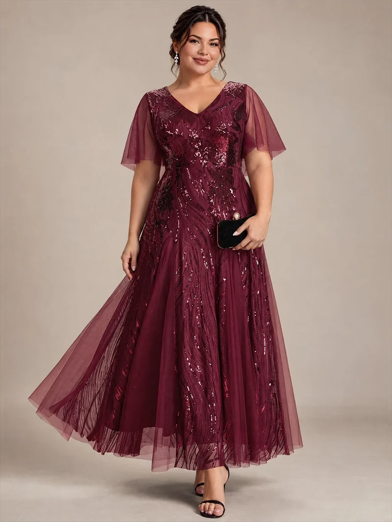 Robe longue en tulle à paillettes avec manches volantées