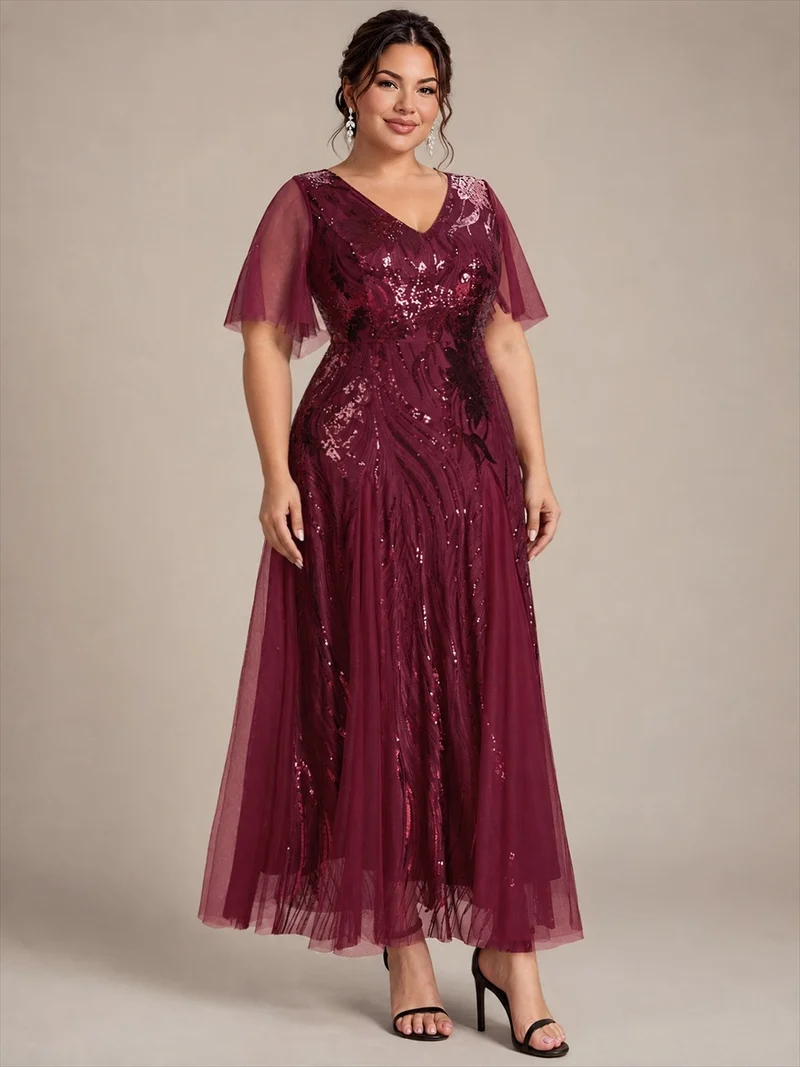 Robe longue en tulle à paillettes avec manches volantées