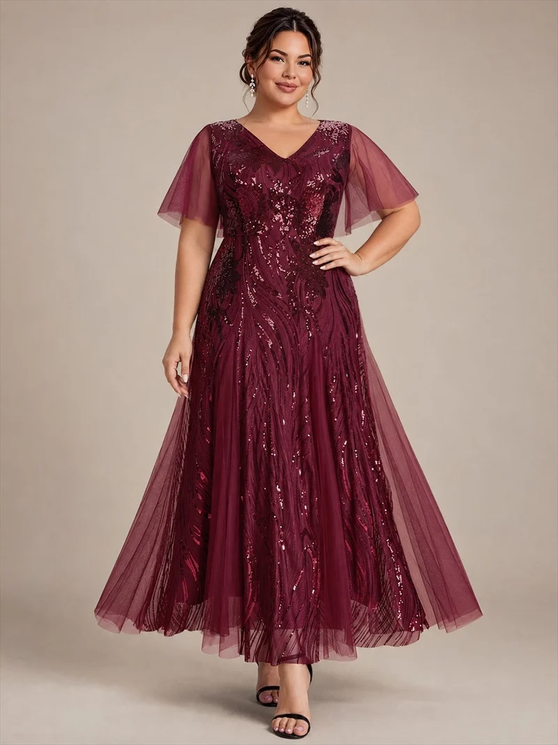 Robe longue en tulle à paillettes avec manches volantées