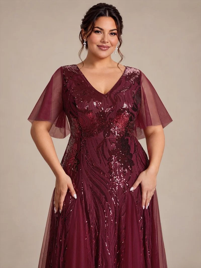 Robe longue en tulle à paillettes avec manches volantées