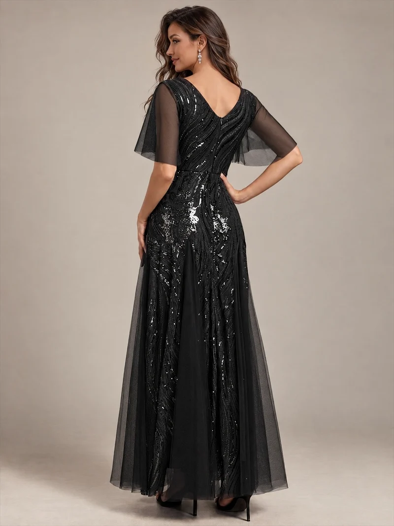 Robe longue en tulle à paillettes avec manches volantées