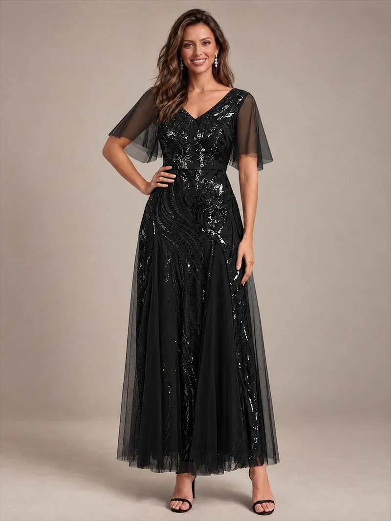 Robe longue en tulle à paillettes avec manches volantées