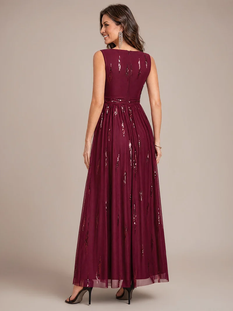 Robe longue sans manches en tulle à paillettes drapé