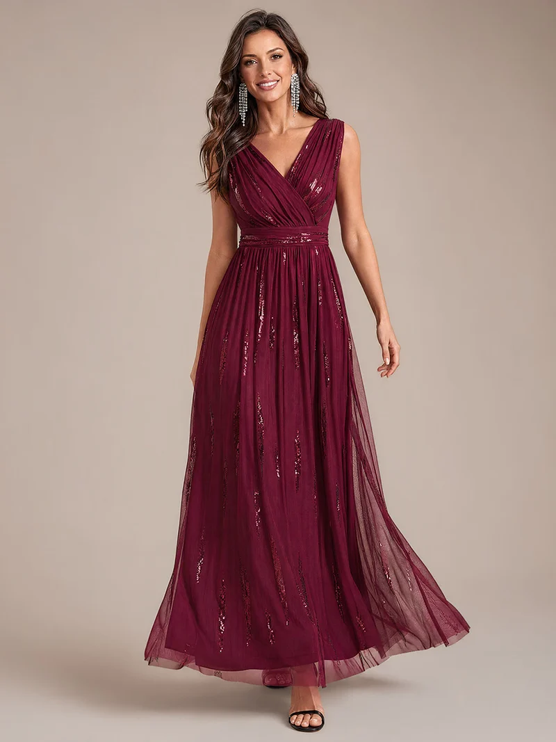 Robe longue sans manches en tulle à paillettes drapé