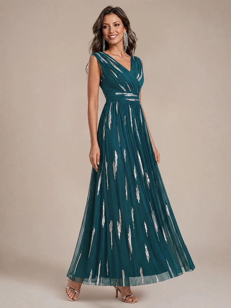 Robe longue sans manches en tulle à paillettes drapé