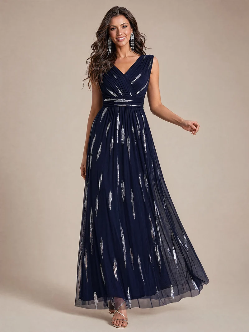 Robe longue sans manches en tulle à paillettes drapé