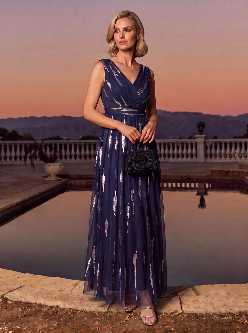Robe longue sans manches en tulle à paillettes drapé