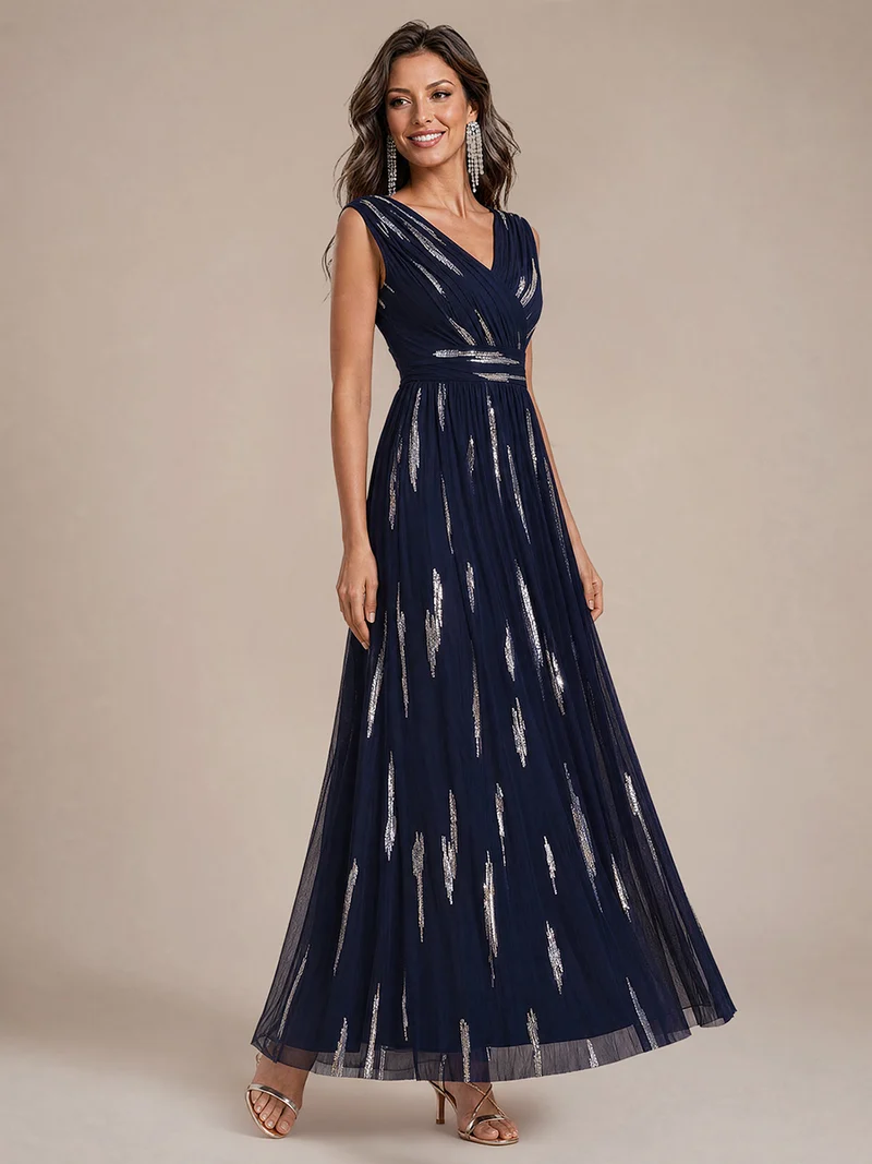 Robe longue sans manches en tulle à paillettes drapé