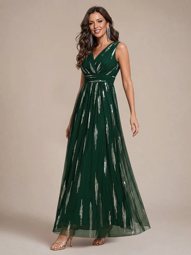 Robe longue sans manches en tulle à paillettes drapé