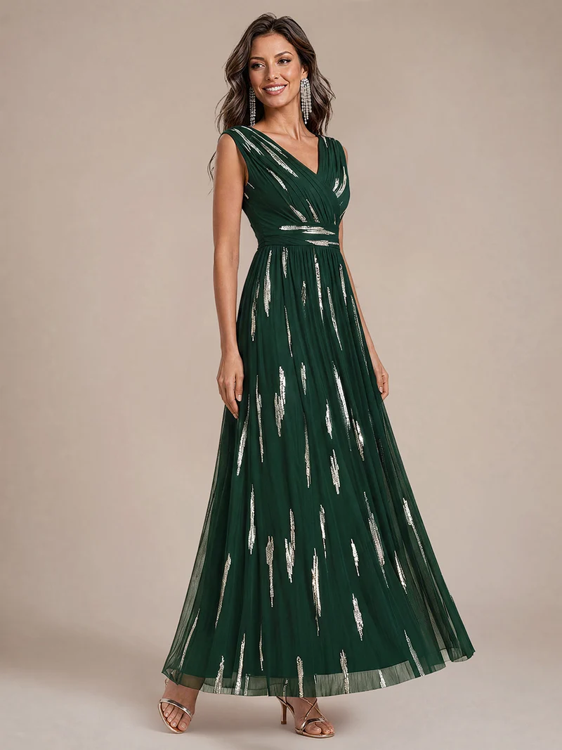 Robe longue sans manches en tulle à paillettes drapé