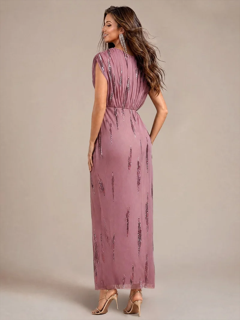 Robe longue en tulle à paillettes avec manches chauve-souris et col V