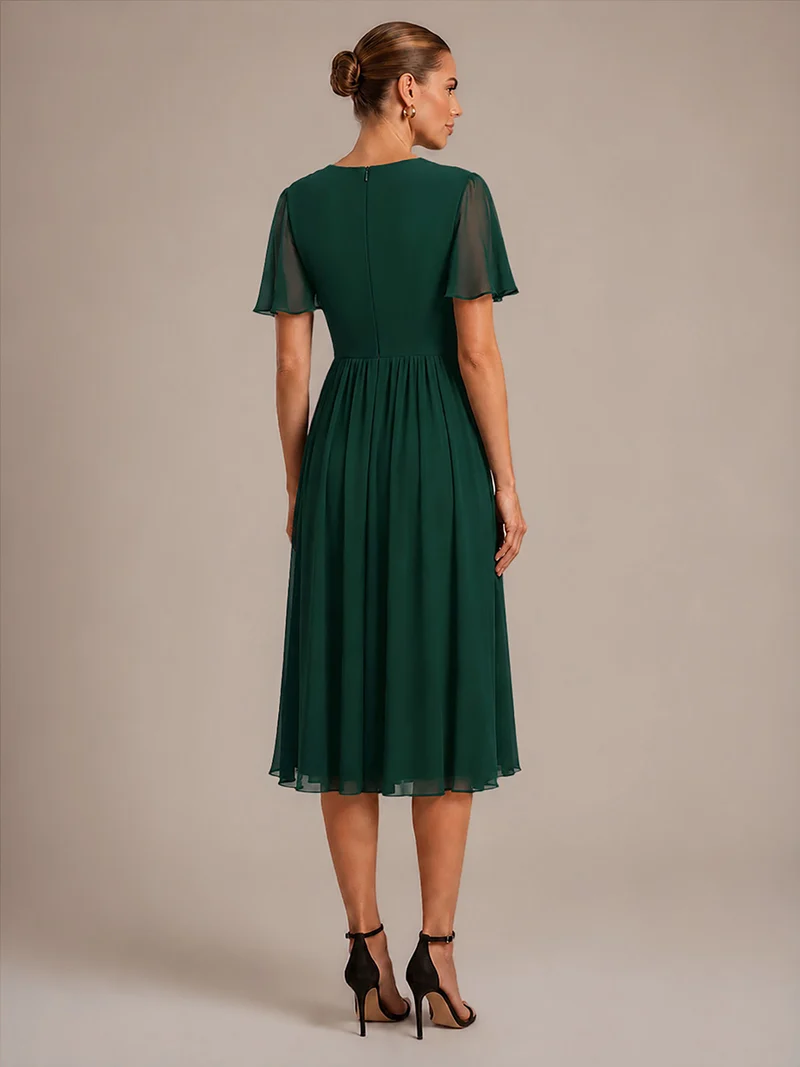 Robe midi plissée en mousseline à manches volantées