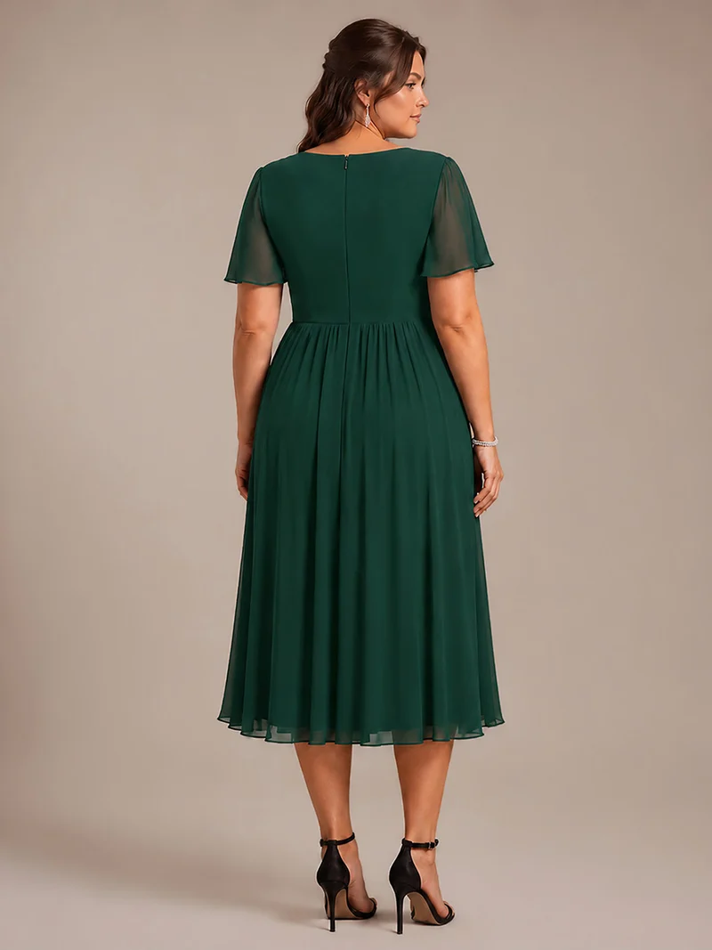 Robe midi plissée en mousseline à manches volantées