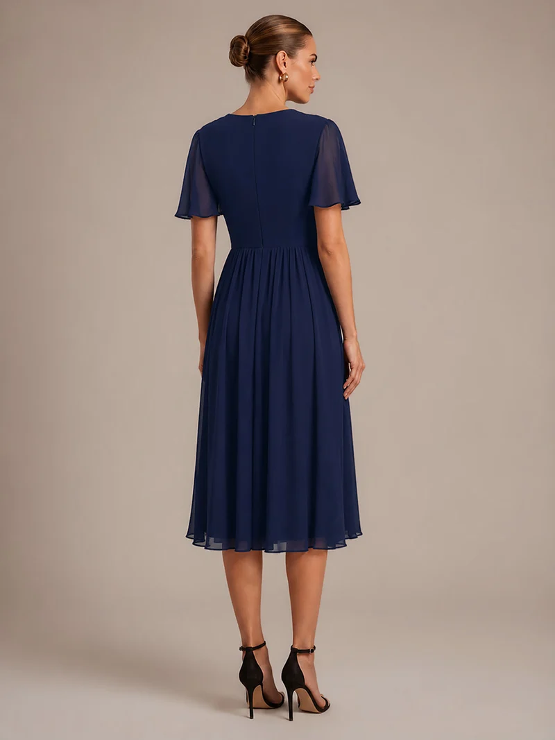 Robe midi plissée en mousseline à manches volantées
