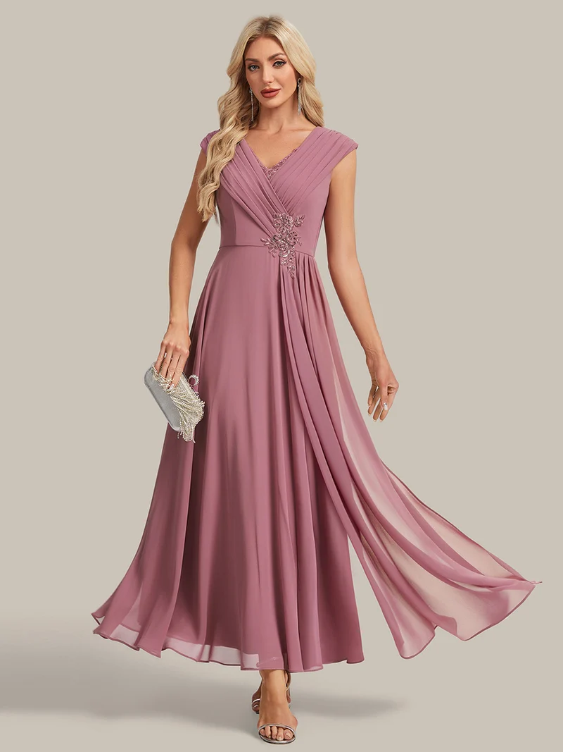 Robe longue en mousseline à appliqué floral, coupe trapèze