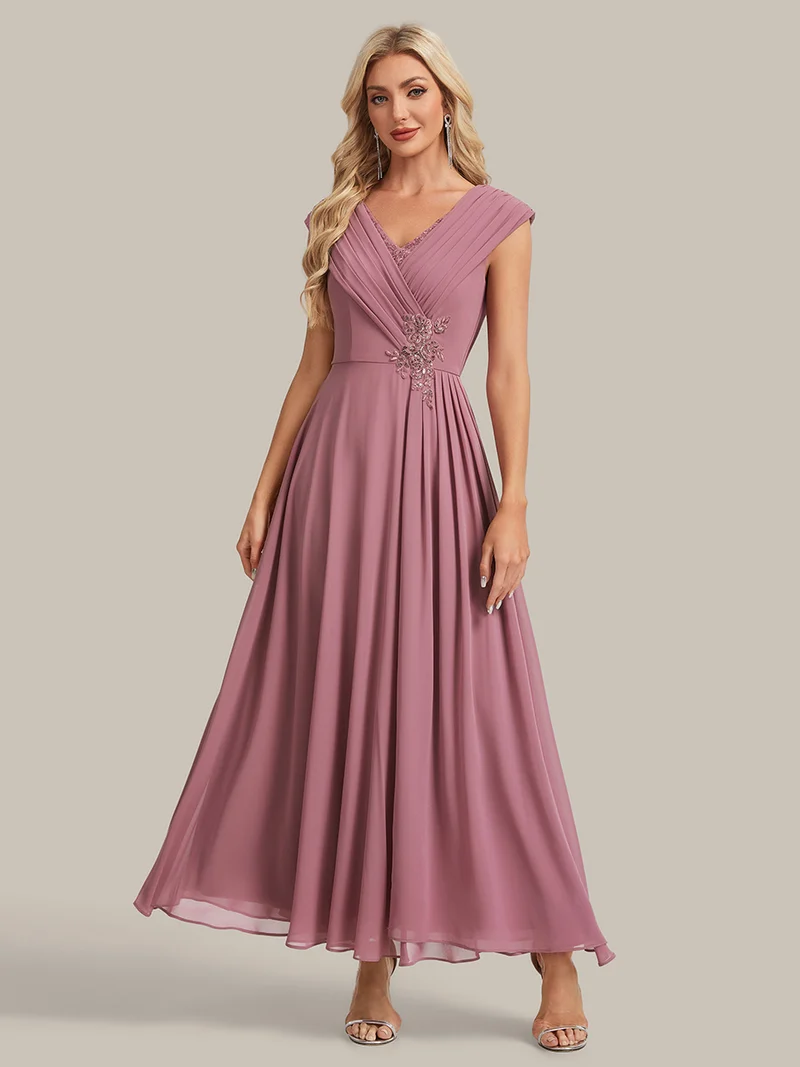 Robe longue en mousseline à appliqué floral, coupe trapèze