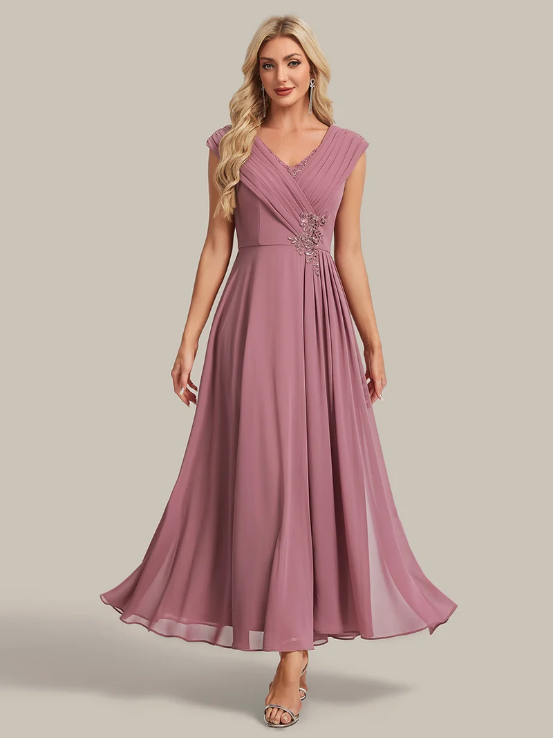 Robe longue en mousseline à appliqué floral, coupe trapèze