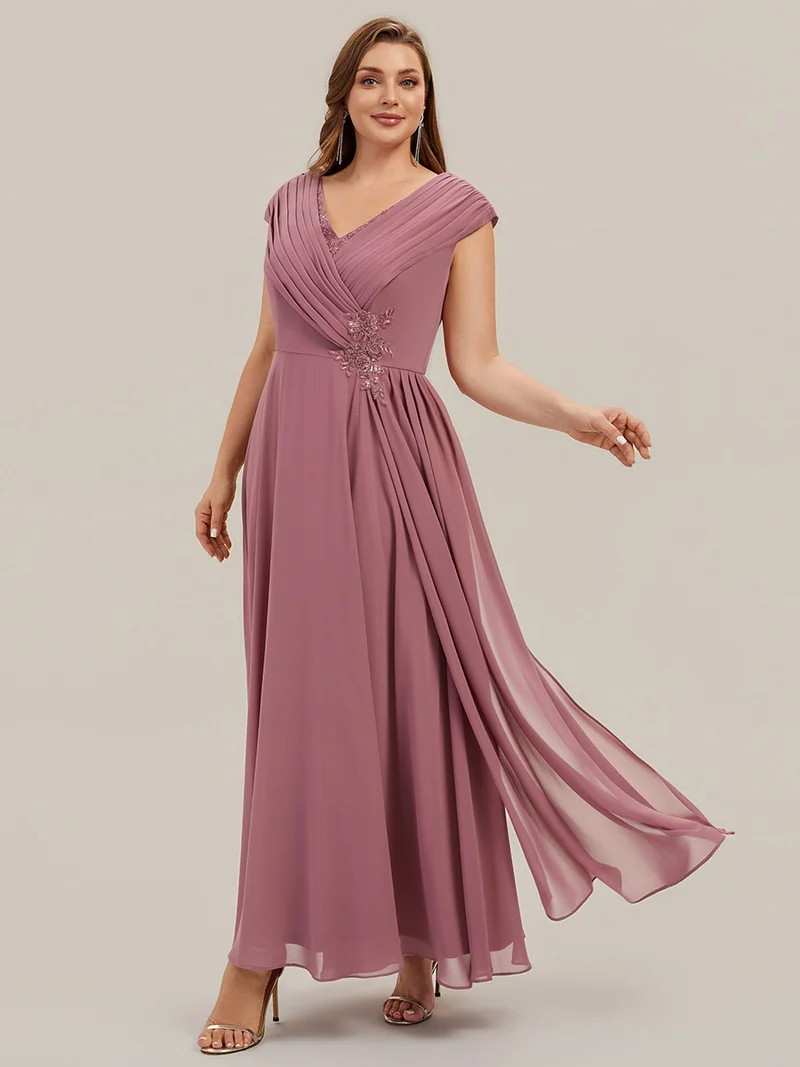 Robe longue en mousseline à appliqué floral, coupe trapèze