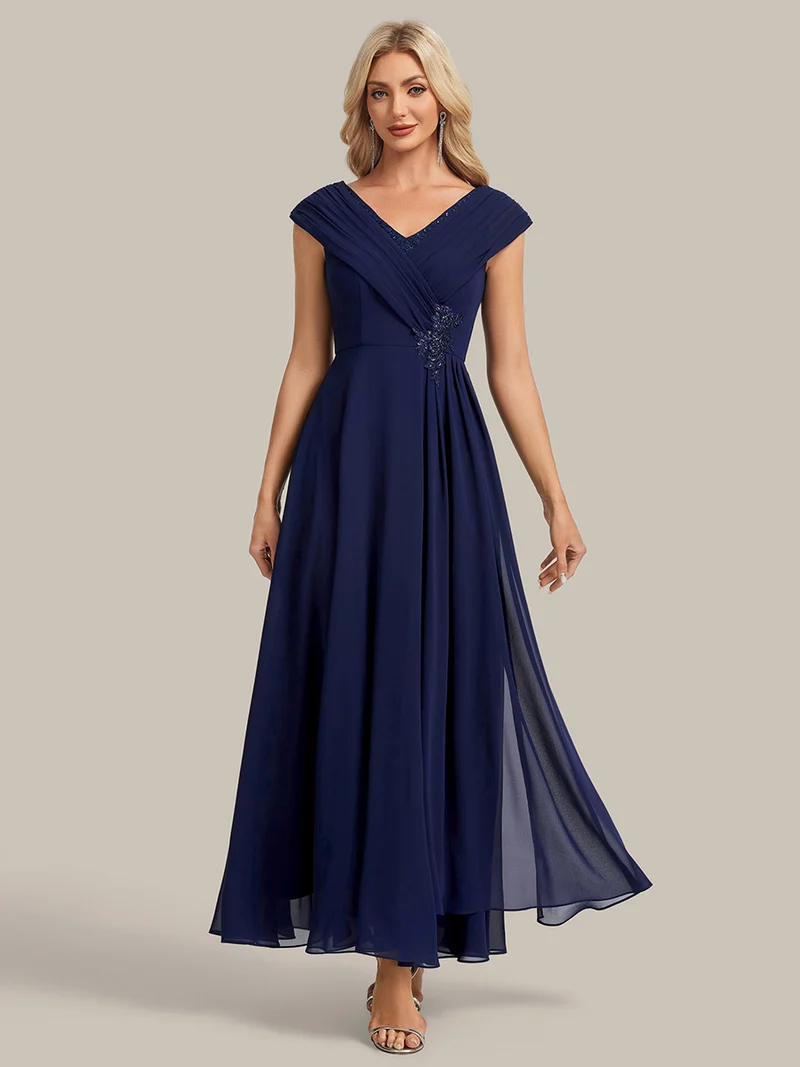 Robe longue en mousseline à appliqué floral, coupe trapèze