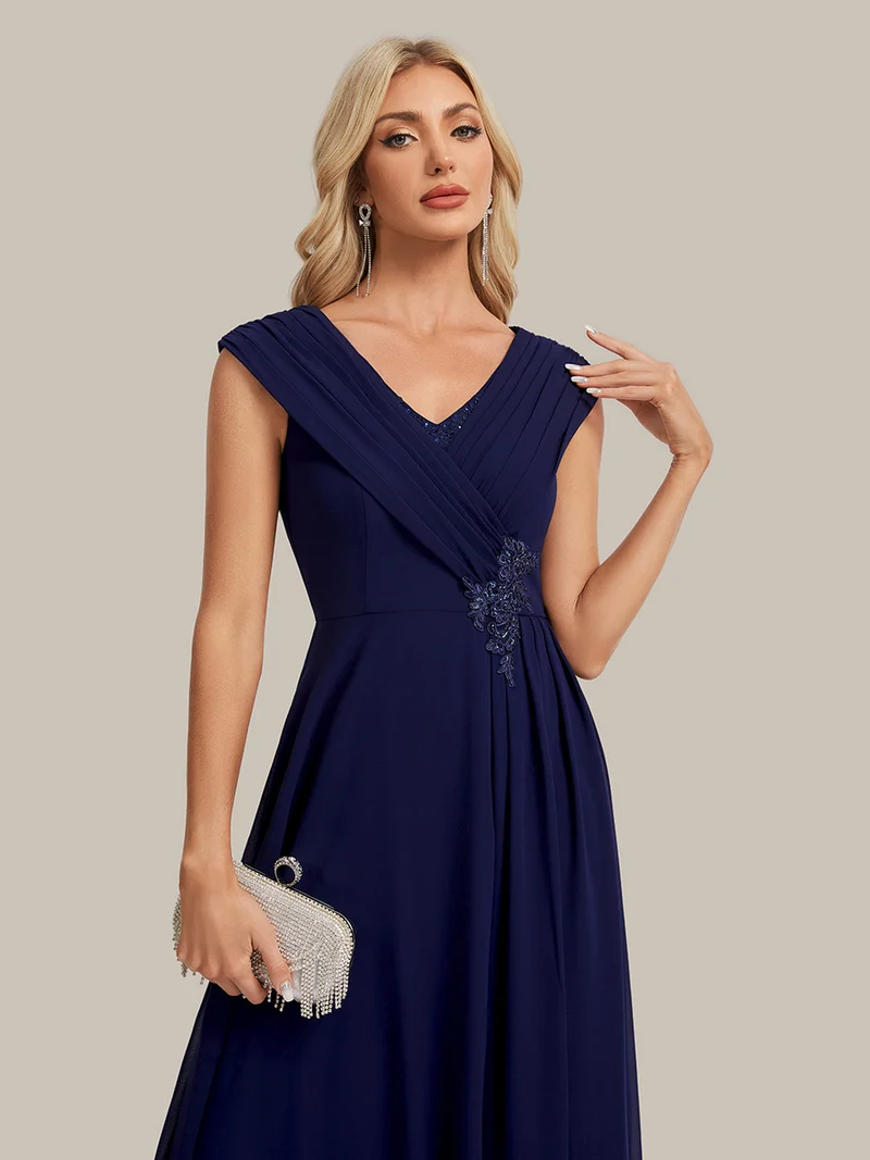 Robe longue en mousseline à appliqué floral, coupe trapèze