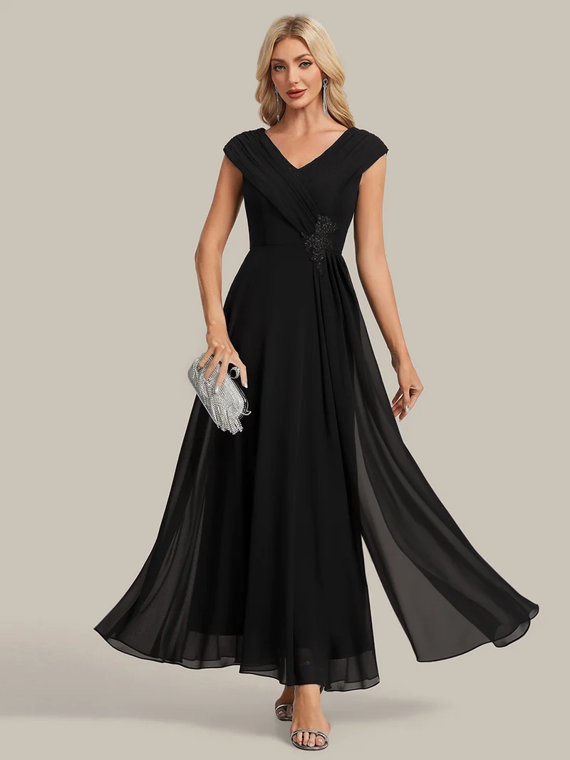 Robe longue en mousseline à appliqué floral, coupe trapèze
