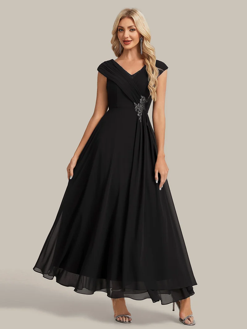 Robe longue en mousseline à appliqué floral, coupe trapèze