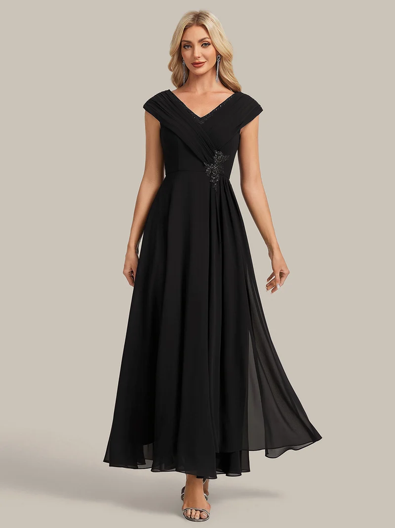 Robe longue en mousseline à appliqué floral, coupe trapèze