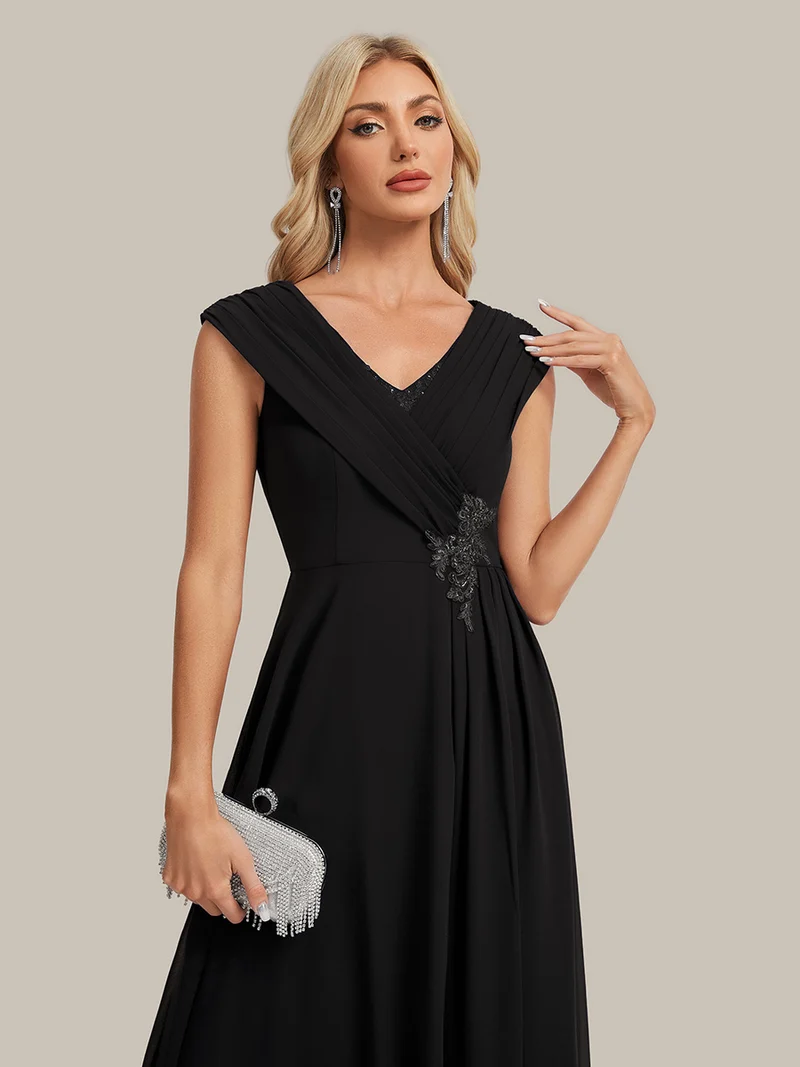 Robe longue en mousseline à appliqué floral, coupe trapèze