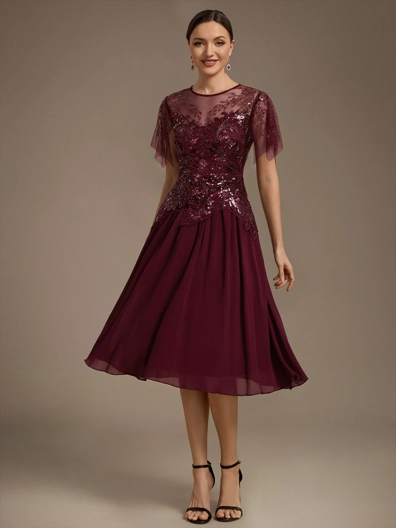 Robe midi en tulle ornée de perles et de paillettes, avec manches volantées