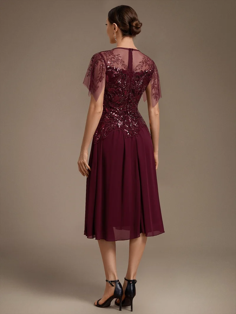 Robe midi en tulle ornée de perles et de paillettes, avec manches volantées
