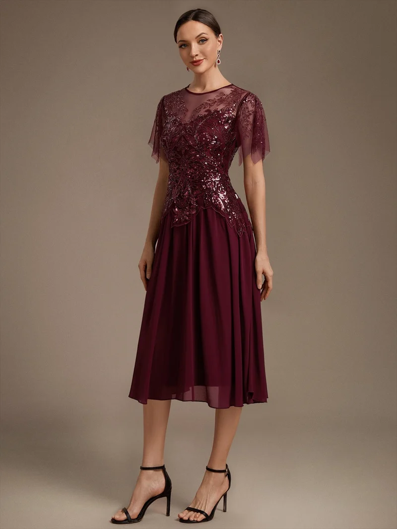 Robe midi en tulle ornée de perles et de paillettes, avec manches volantées
