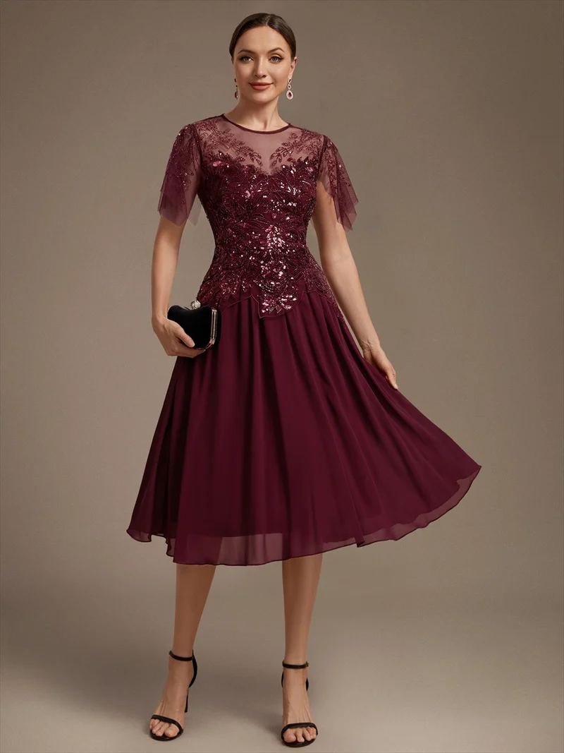 Robe midi en tulle ornée de perles et de paillettes, avec manches volantées