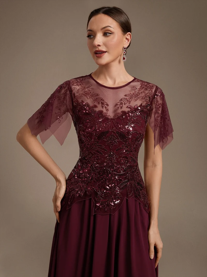 Robe midi en tulle ornée de perles et de paillettes, avec manches volantées