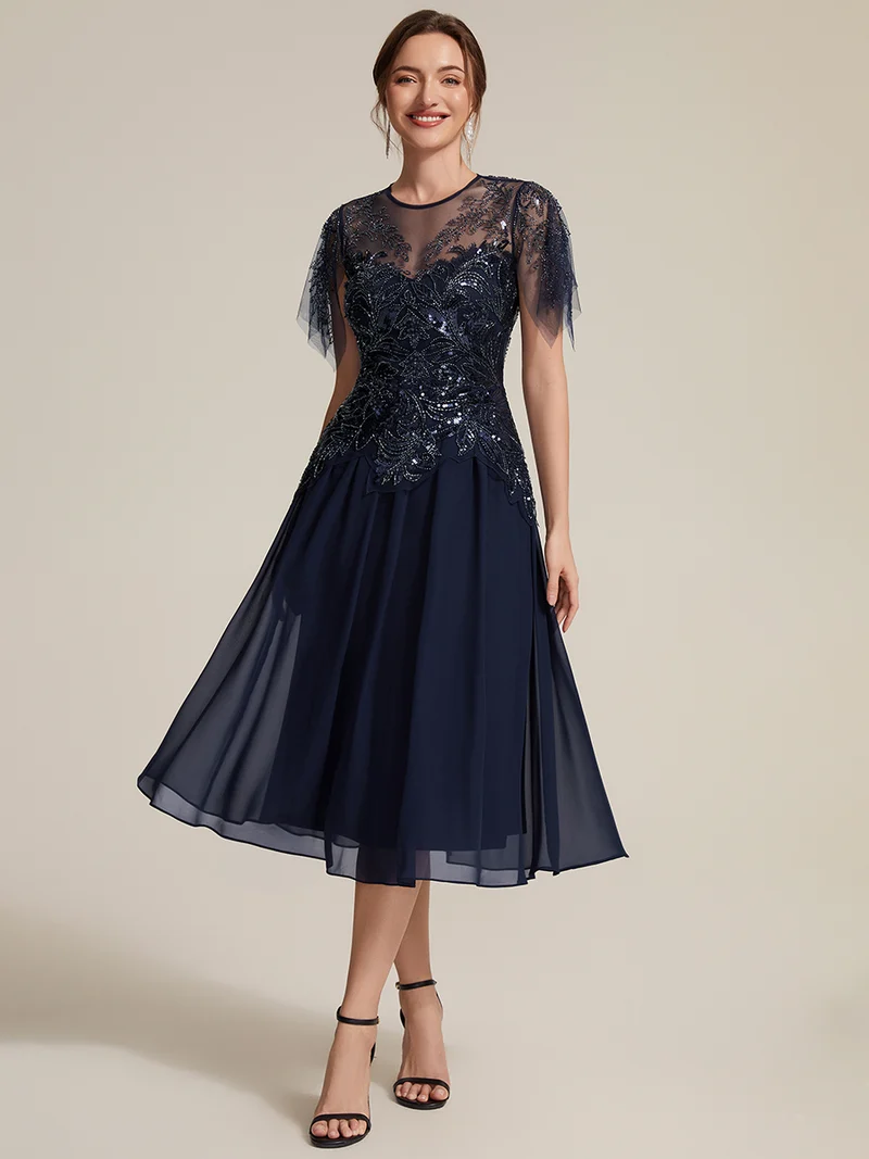 Robe midi en tulle ornée de perles et de paillettes, avec manches volantées