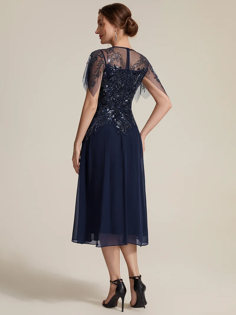 Robe midi en tulle ornée de perles et de paillettes, avec manches volantées