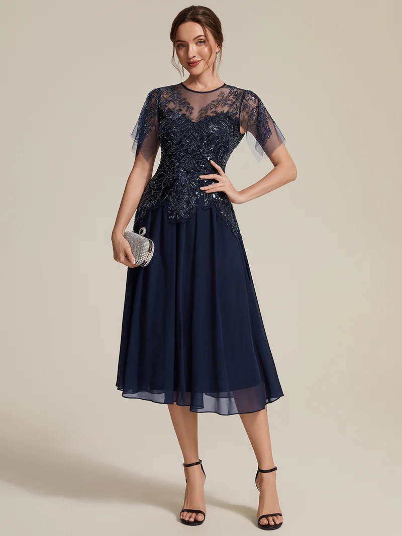 Robe midi en tulle ornée de perles et de paillettes, avec manches volantées