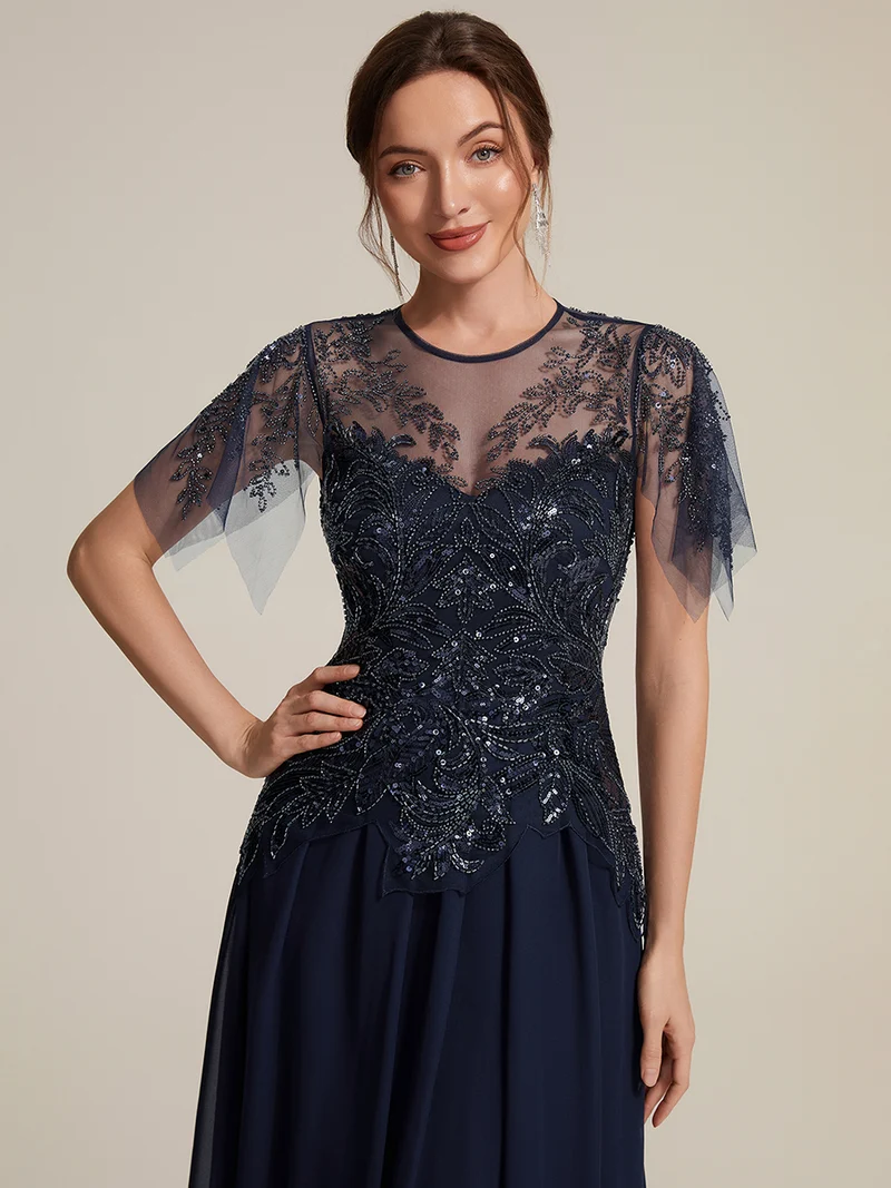 Robe midi en tulle ornée de perles et de paillettes, avec manches volantées