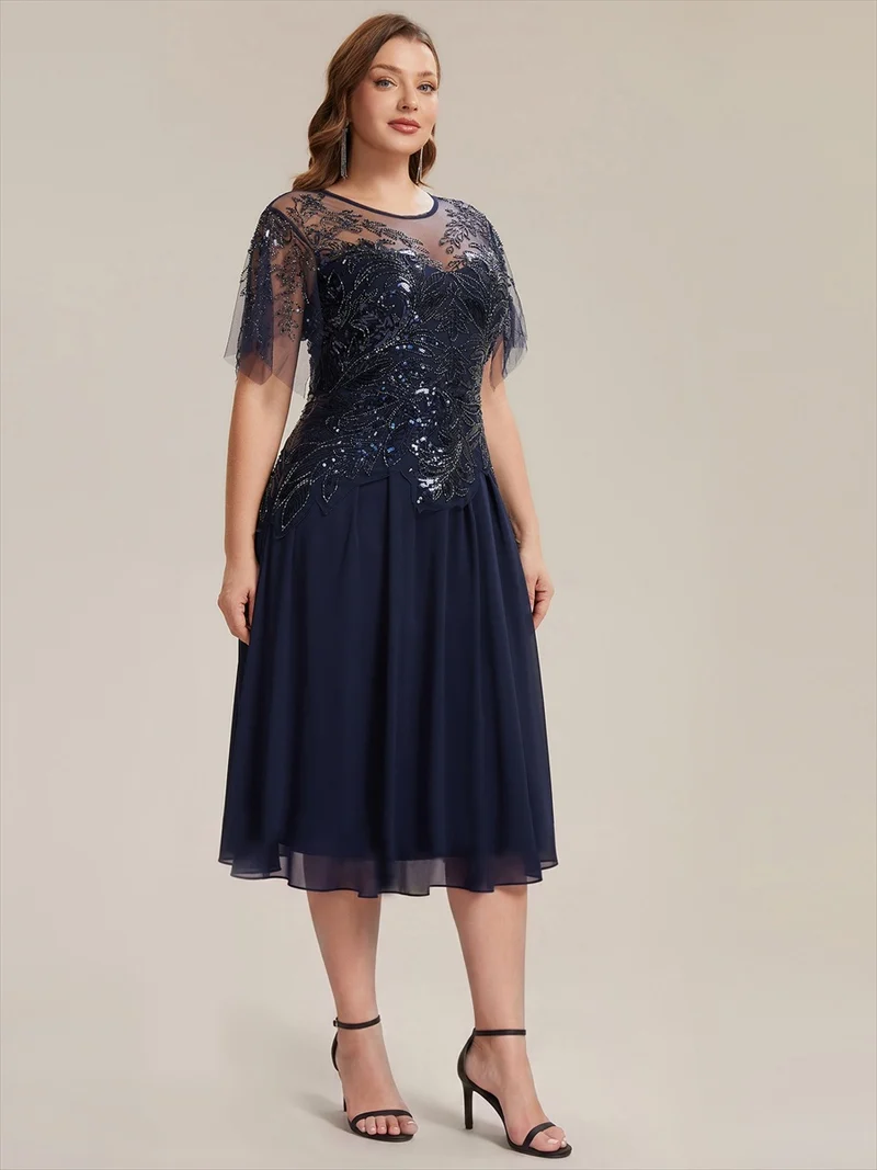 Robe midi en tulle ornée de perles et de paillettes, avec manches volantées