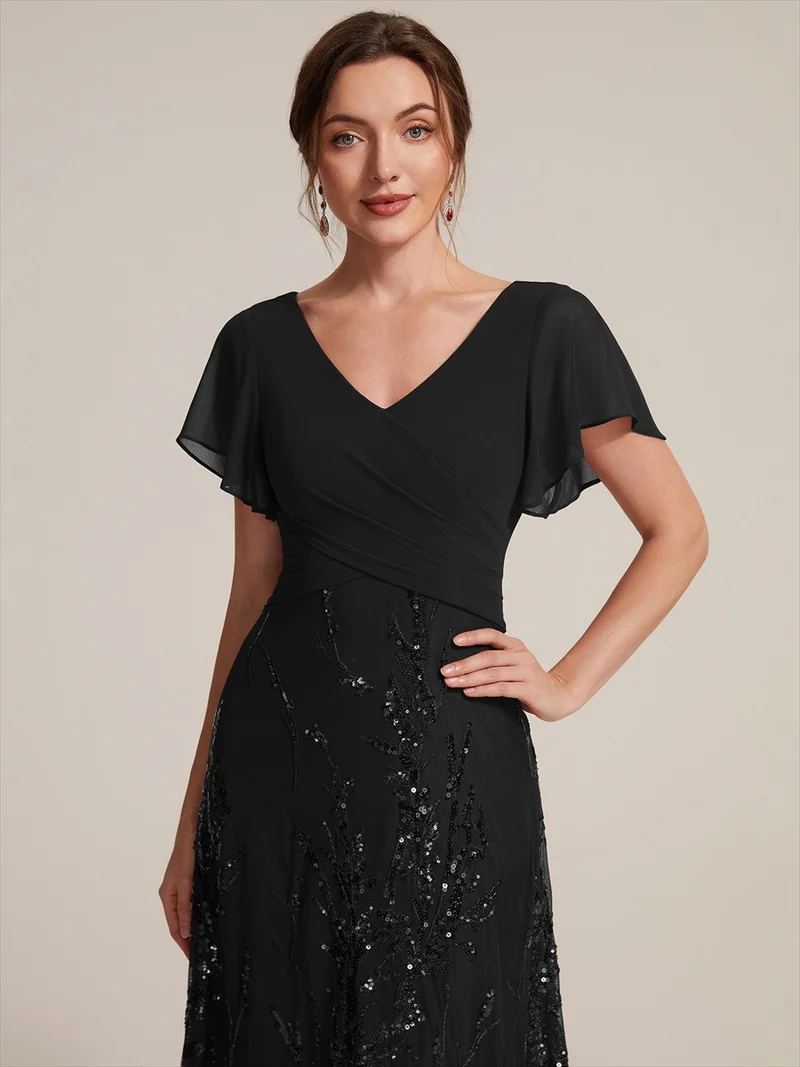 Robe midi en mousseline à paillettes avec col V et manches volantées
