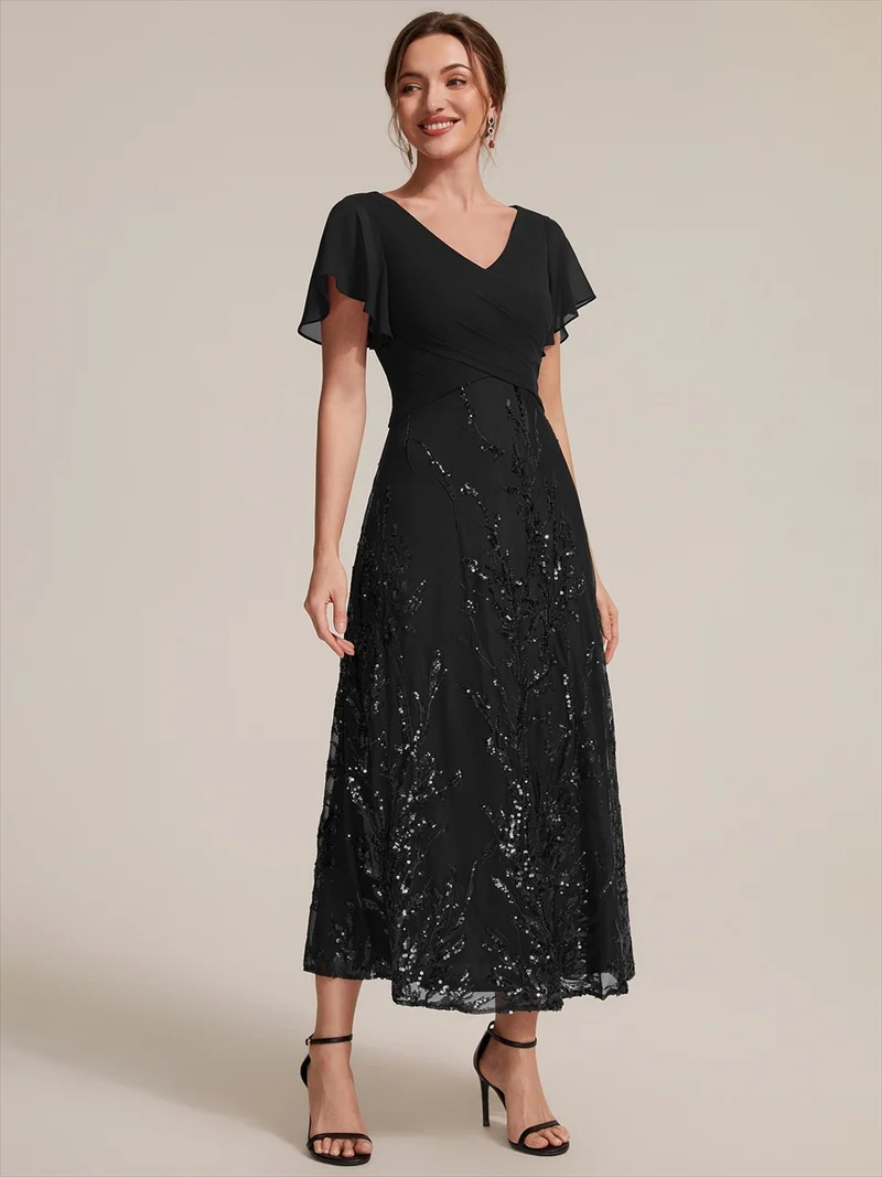 Robe midi en mousseline à paillettes avec col V et manches volantées