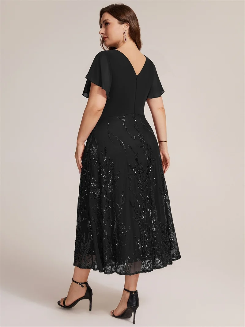 Robe midi en mousseline à paillettes avec col V et manches volantées
