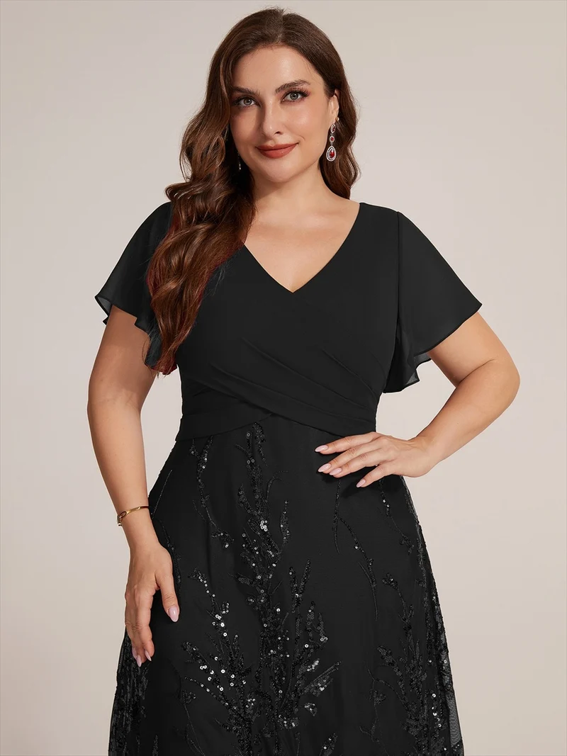 Robe midi en mousseline à paillettes avec col V et manches volantées